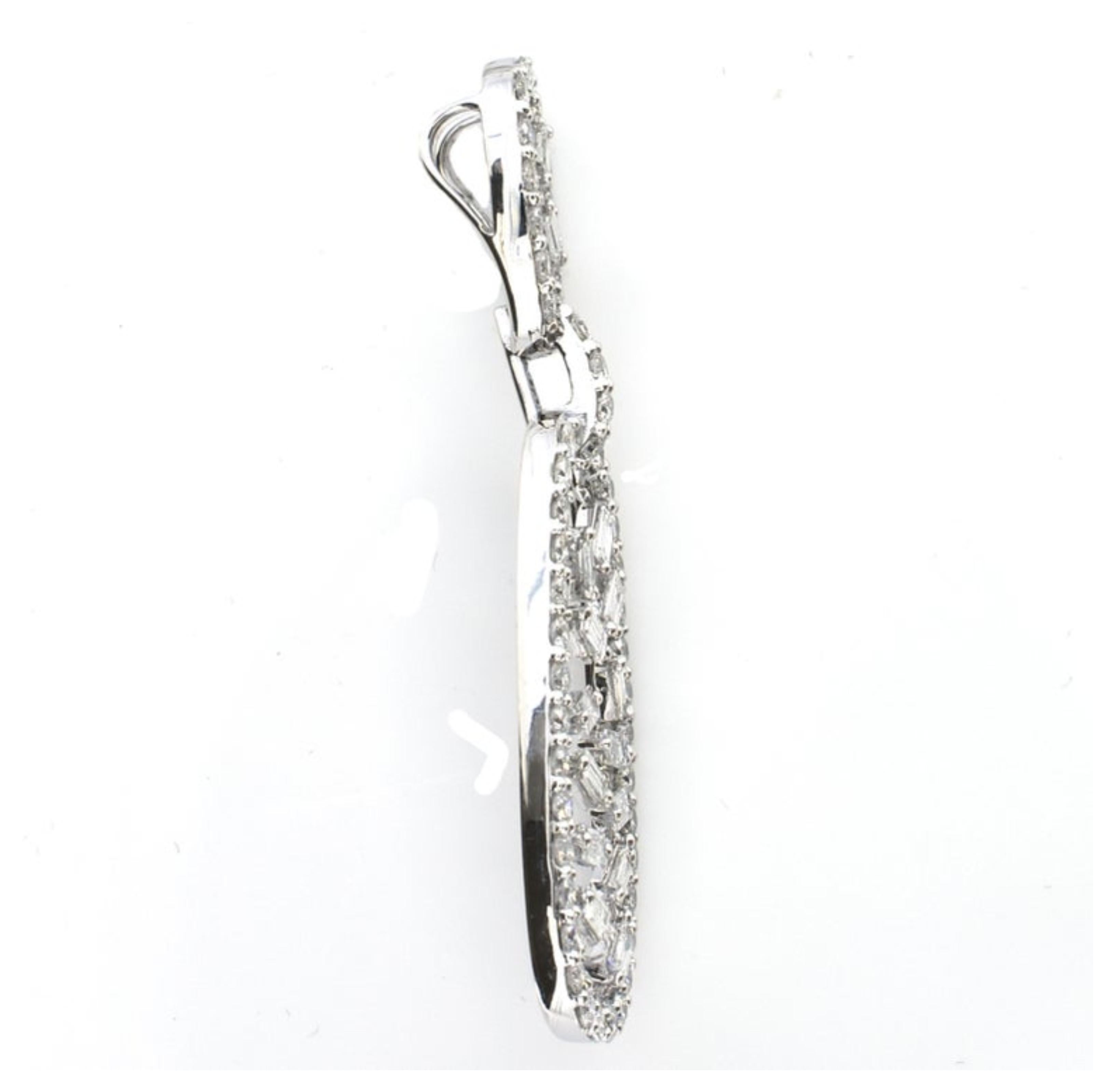 This beautiful 2.94 Carat Baguette Fashion Diamond Pendant features streaming down design of baguette diamonds. This pendant features 1.19 Carats of Baguette Diamonds and 1.75 Carats of Round White Diamonds. The pendant is set in 18K White Gold and