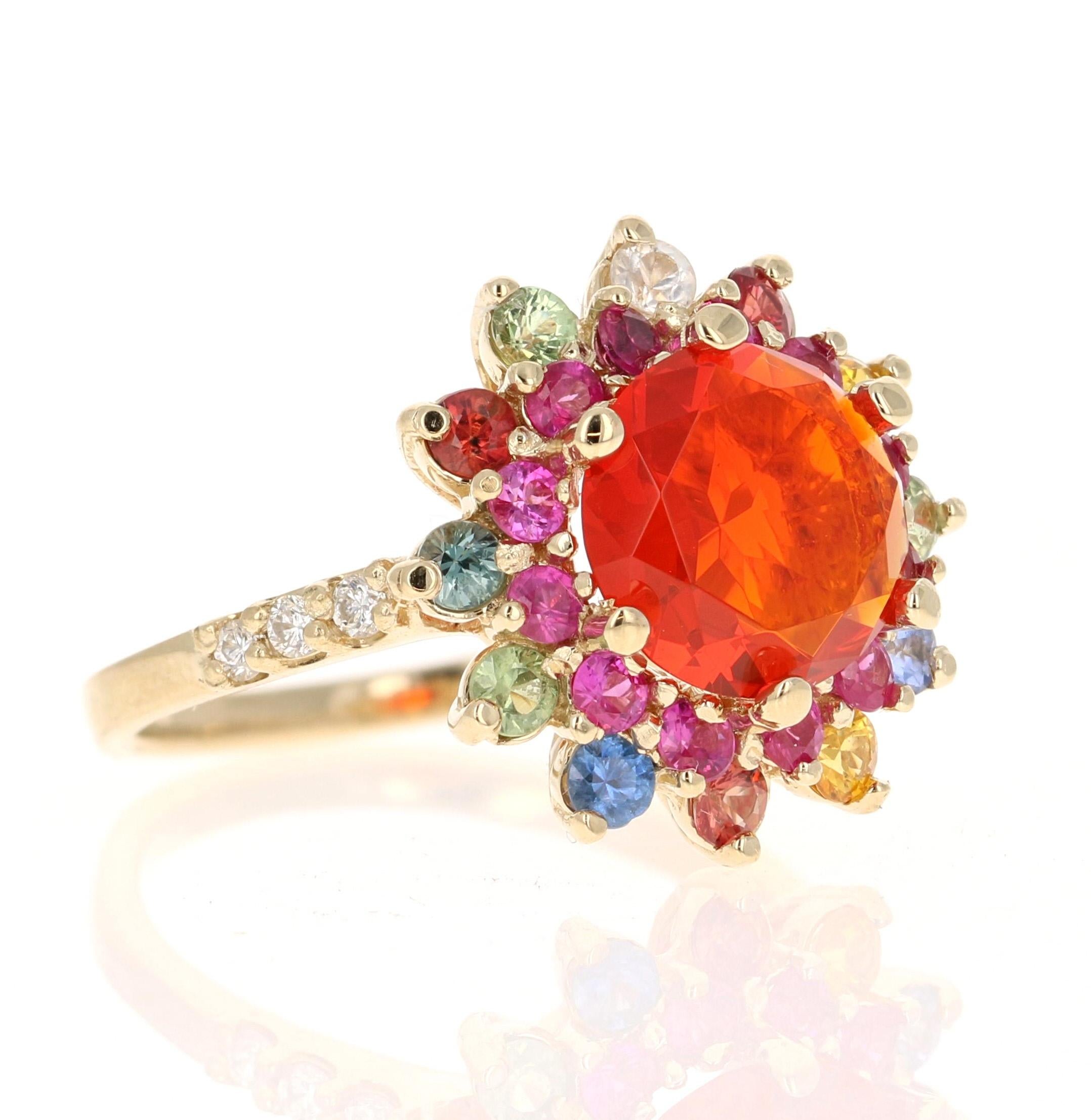 2.94 Carat Fire Opal Sapphire Diamond 14 Karat Yellow Gold Ring


This Ring features a Round Cut Fire Opal weighing 1.50 Carats, surrounded by Multi-Colored Sapphires weighing 1.33 Carats. Accentuated with Diamonds that weigh 0.11 carats, this piece