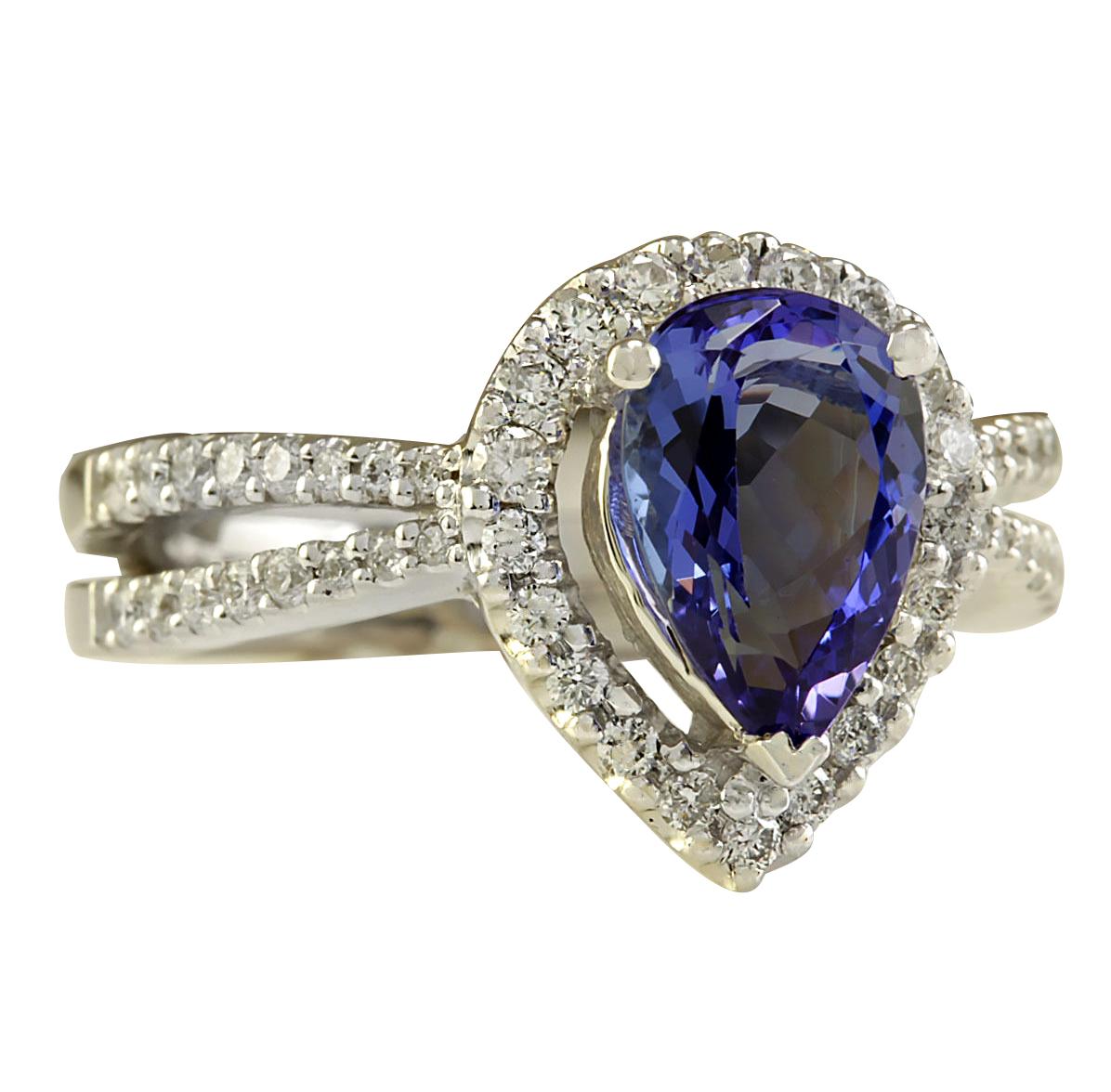 Stamped: 14K White Gold
Total Ring Weight: 6.1 Grams
Total Natural Tanzanite Weight is 1.68 Carat (Measures: 10.00x7.00 mm)
Color: Blue
Total Natural Diamond Weight is 1.26 Carat
Color: F-G, Clarity: VS2-SI1
Face Measures: 13.55x11.85 mm
Sku: