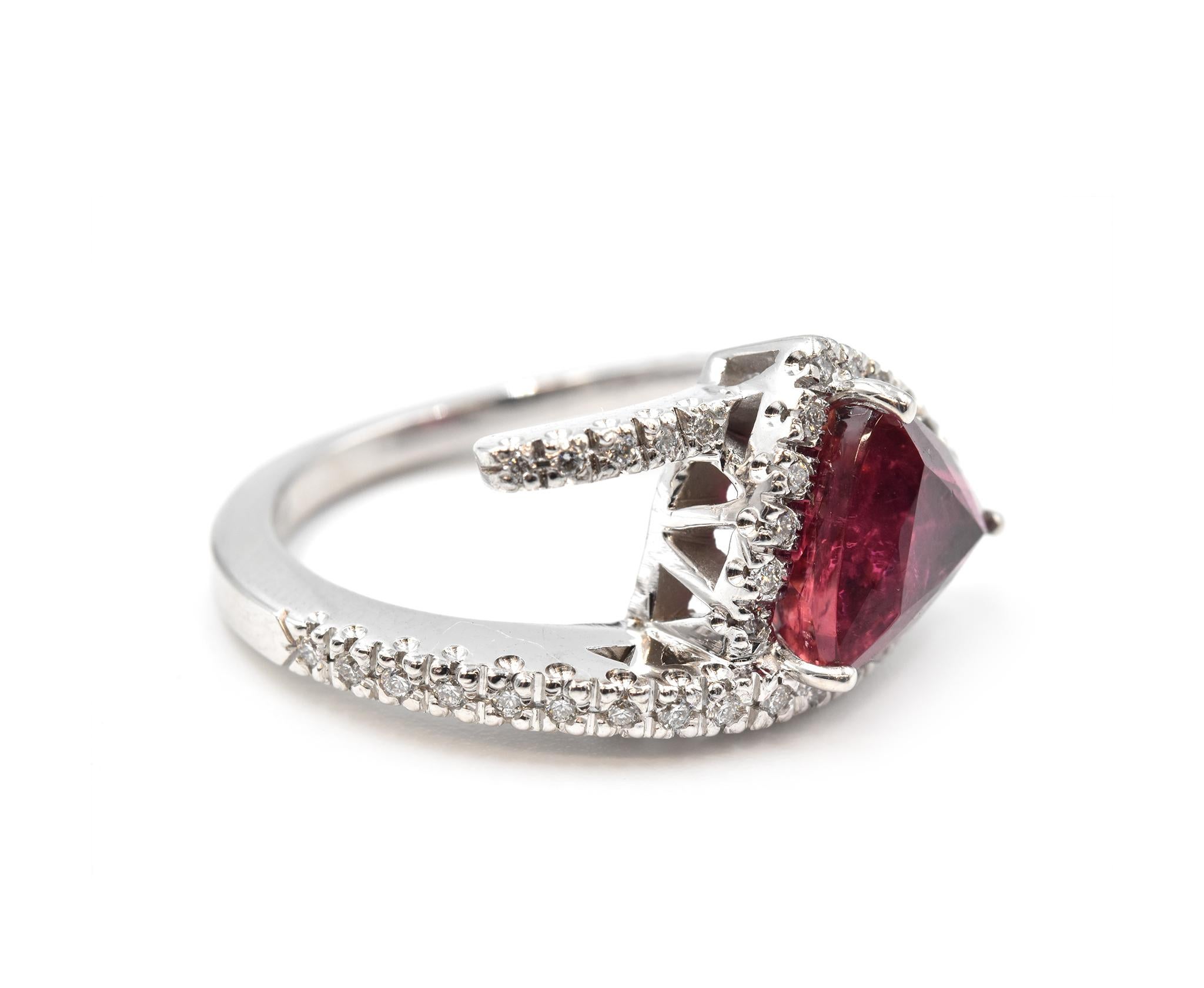 Designer: custom design
Material: 14k white gold
Rubellite: one trilliant cut 2.94 carat
Diamonds: 41 round cut = 0.39 carat weight
Color: H
Clarity: SI1
Ring Size: 7 (please allow two additional shipping days for sizing requests) 
Dimensions: ring