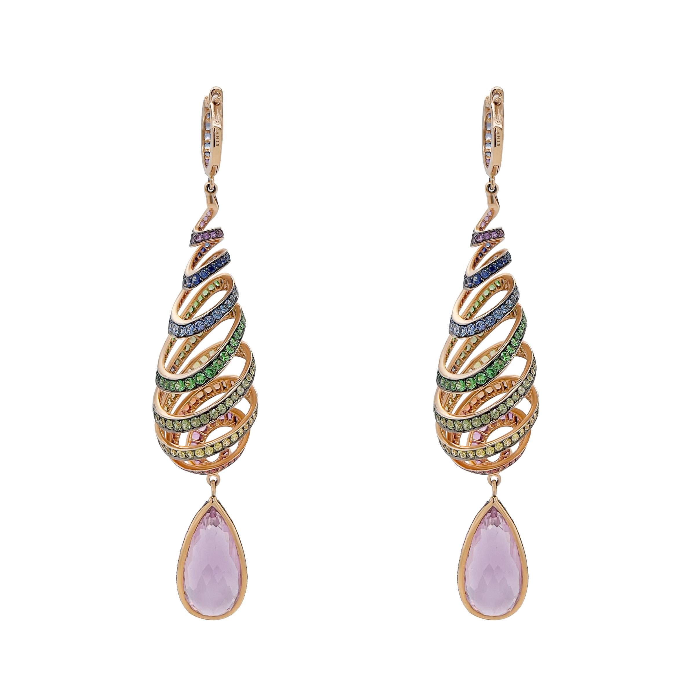 This pair of long 18k pink gold and coloured gemstone earrings are the heart of a three piece set. The teardrop spiral design was carefully and expertly crafted to ensure strength and moveability. The NATURAL coloured stones, including