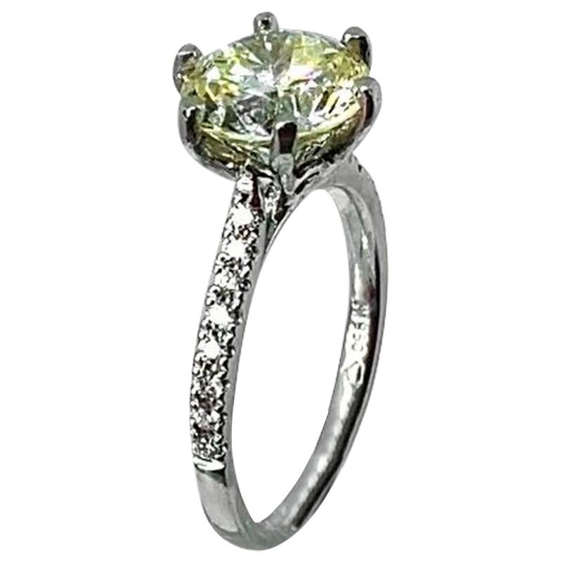 2.94ct certificated light yellow diamond set in platinum 6 claw mount and shank For Sale