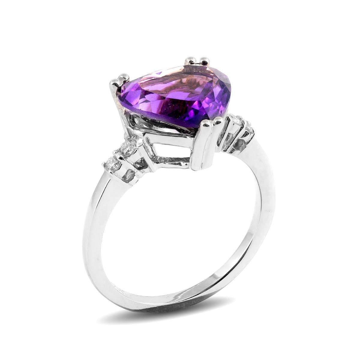 The Amethyst is a gem that offers a spiritual association. This ring showcasing a vibrant 2.95 carat heart, the aubergine stunner is one that is a regal choice for an engagement ring. Paired with diamonds that can be associated to purity, this is