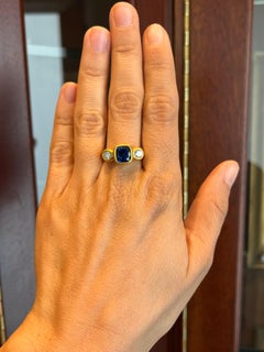 2.95 Carat Cushion Cut Blue Sapphire & 0.56 Carat Diamond 22K Gold 3-Stone Ring