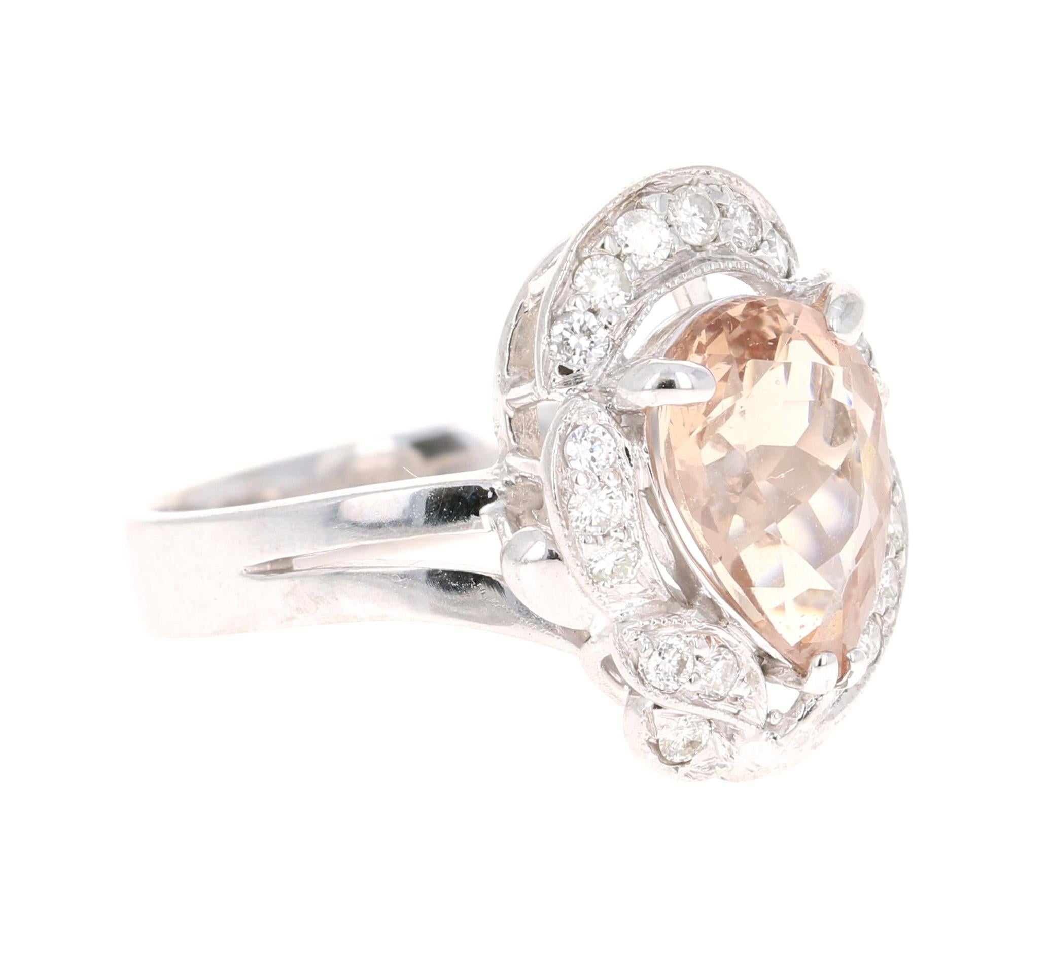 Gorgeous and Unique Morganite Diamond Ring! 

This Morganite ring has a gorgeous 2.61 Carat Pear Cut Morganite and is surrounded by 19 Round Cut Diamonds that weigh 0.34 Carats.  The diamonds have a clarity and color of SI-F. The total carat weight