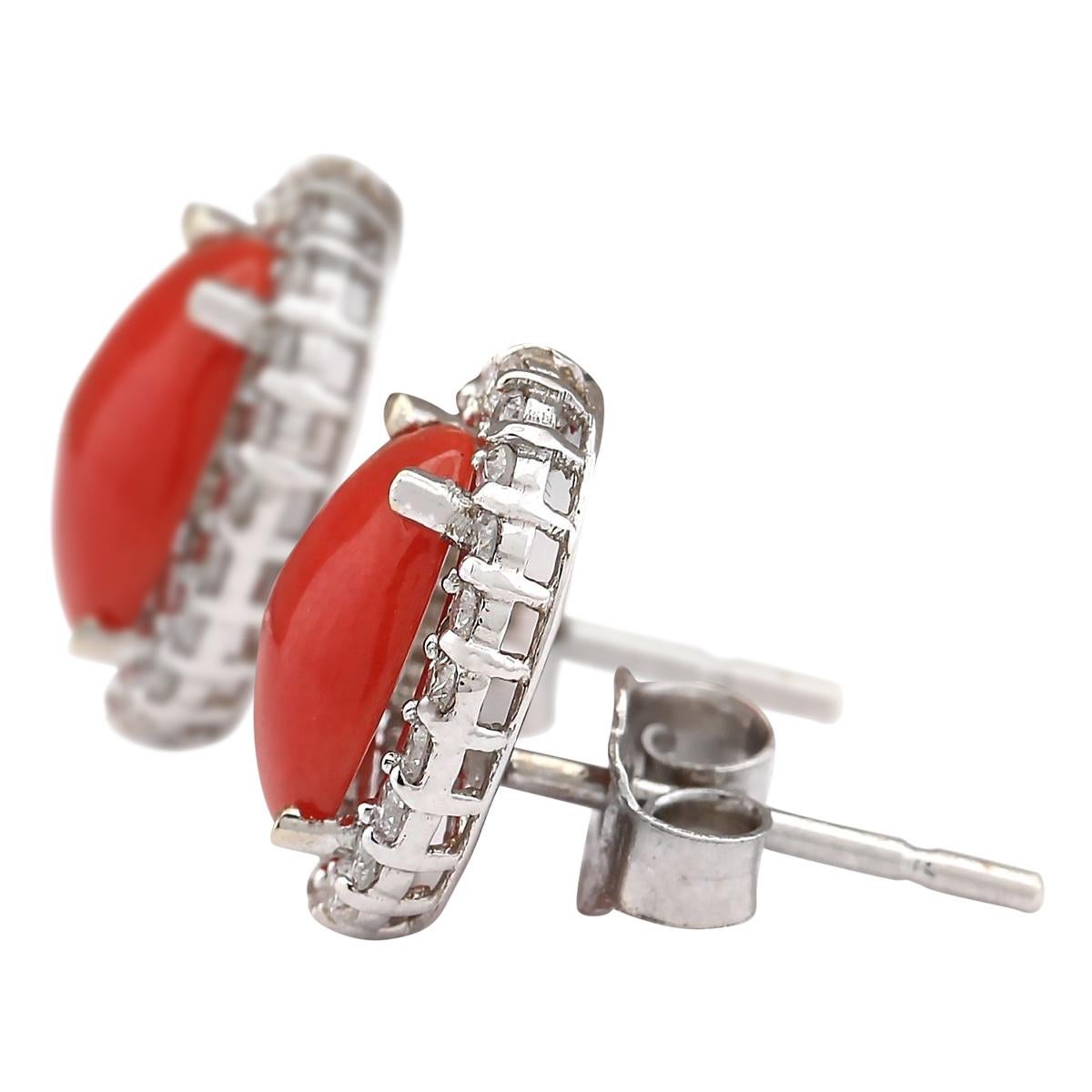 Stamped: 14K White Gold
Total Earrings Weight: 2.2 Grams
Total Natural Coral Weight is 2.30 Carat (Measures: 8.00x6.00 mm)
Color: Red
Total Natural Diamond Weight is 0.65 Carat
Color: F-G, Clarity: VS2-SI1
Face Measures: 12.10x10.10 mm
Sku: [703713W]
