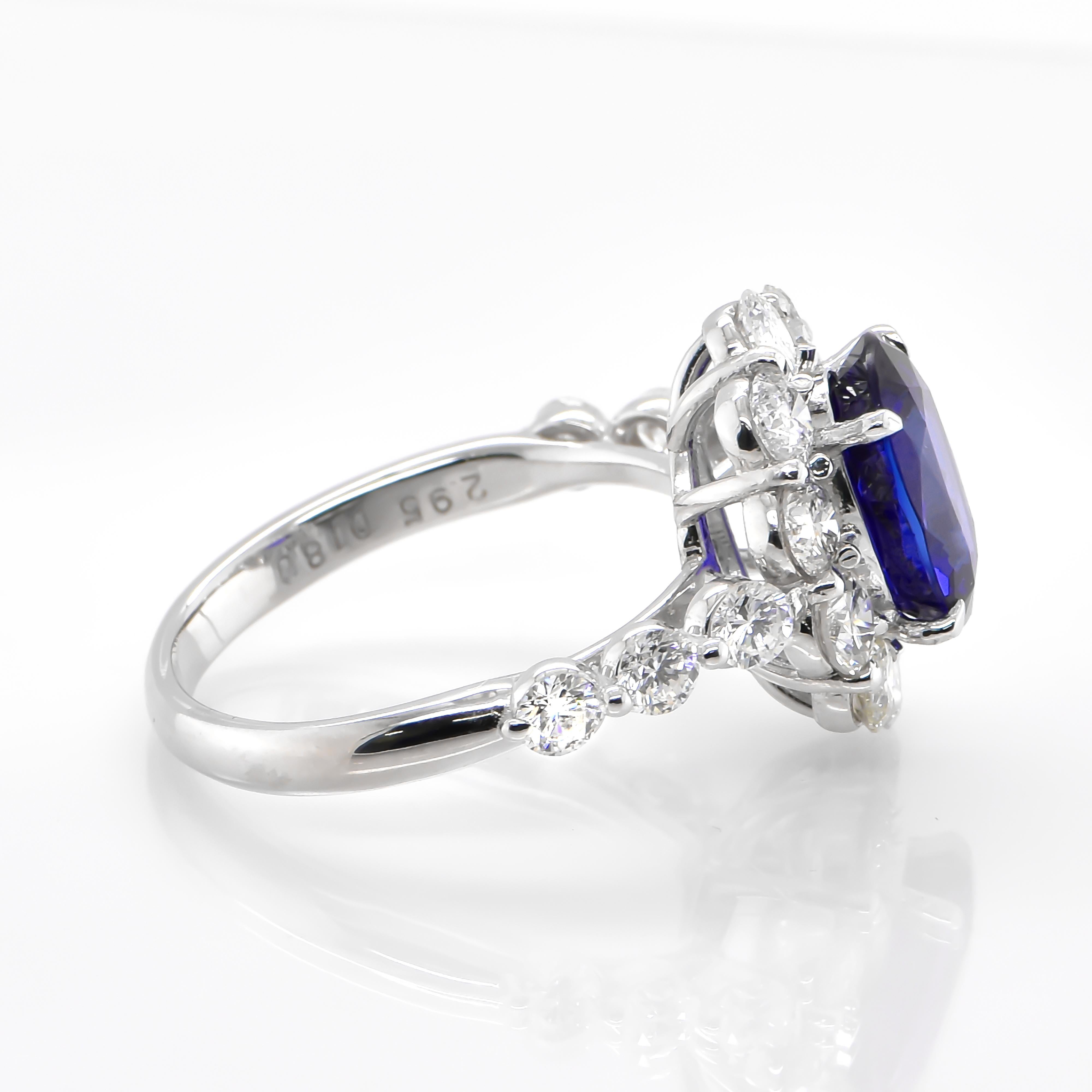 Oval Cut 2.95 Carat Natural Royal Blue Sapphire and Diamond Halo Ring Made in Platinum For Sale