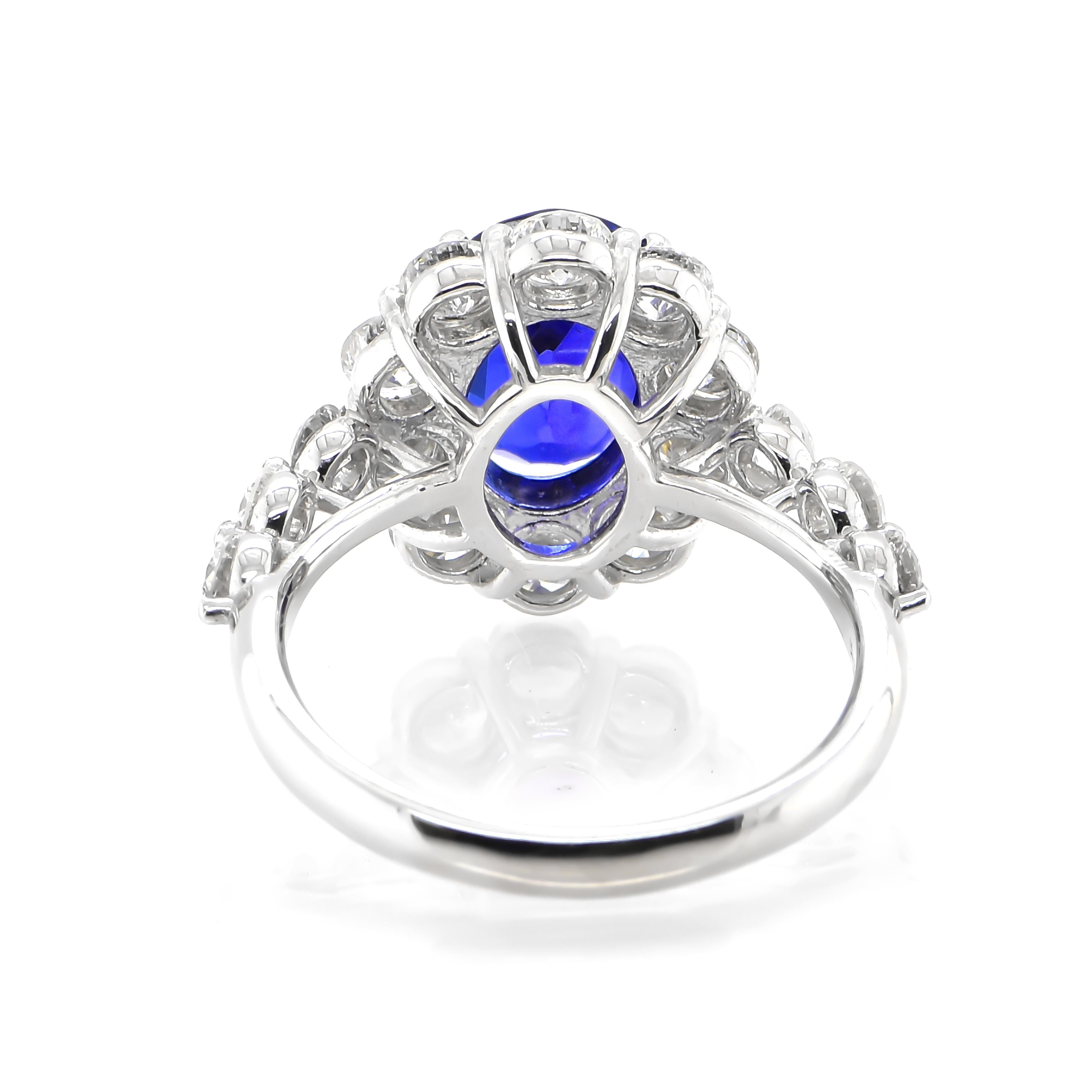 Women's 2.95 Carat Natural Royal Blue Sapphire and Diamond Halo Ring Made in Platinum For Sale