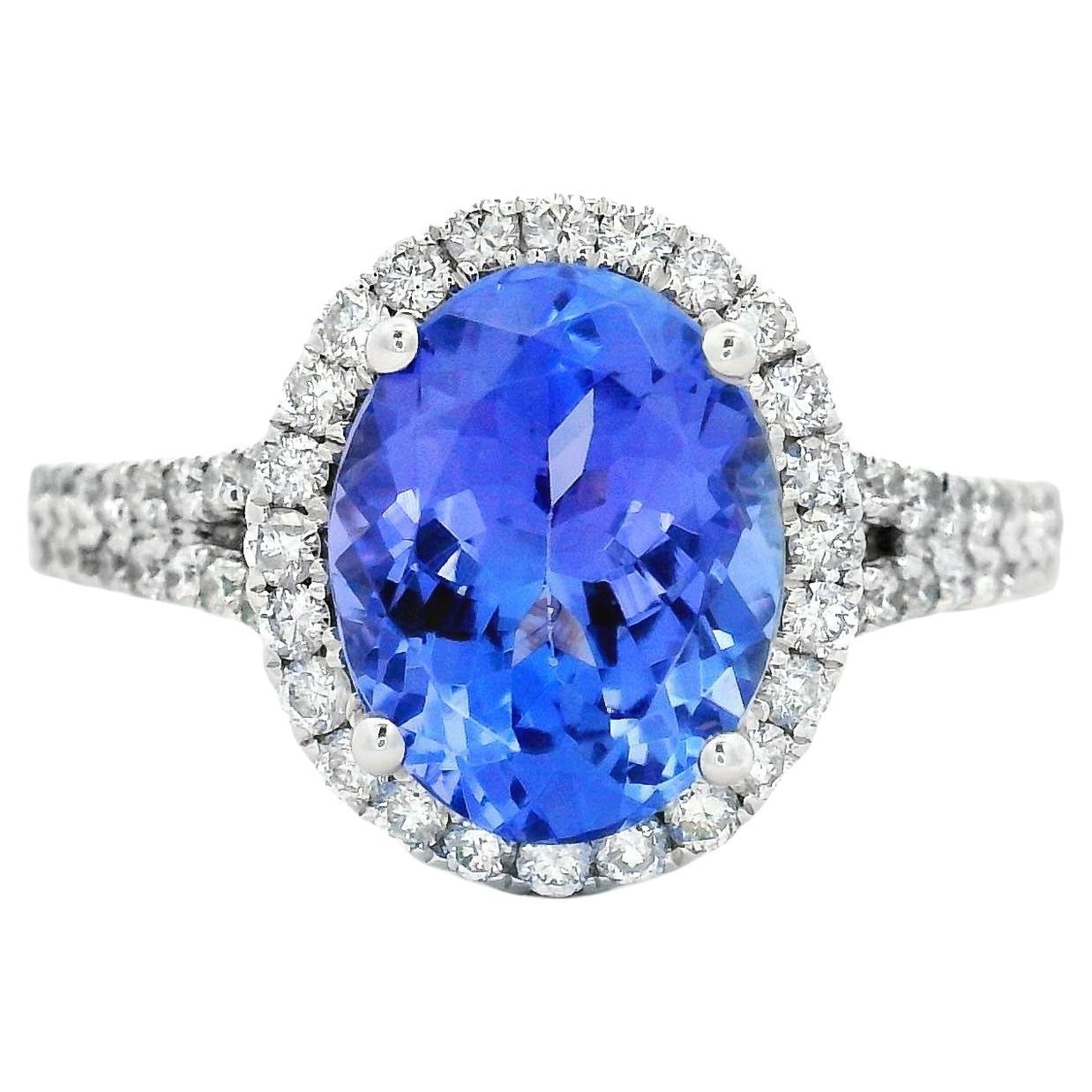 Anello a raggiera con tanzanite ovale e diamante da 2,95 carati in oro bianco 10 carati, misura 7