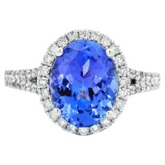 Anello a raggiera con tanzanite ovale e diamante da 2,95 carati in oro bianco 10 carati, misura 7