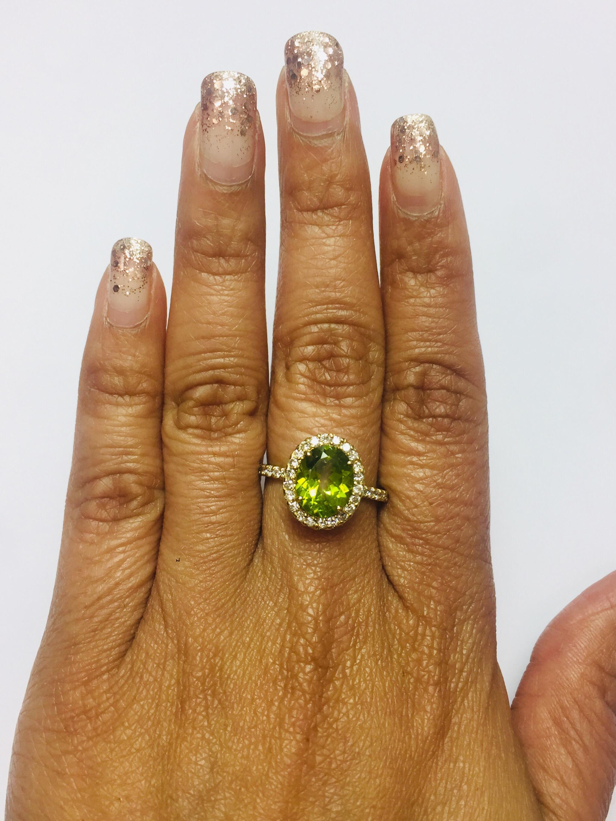 2.95 Carat Peridot Diamond 14 Karat Yellow Gold Ring 2