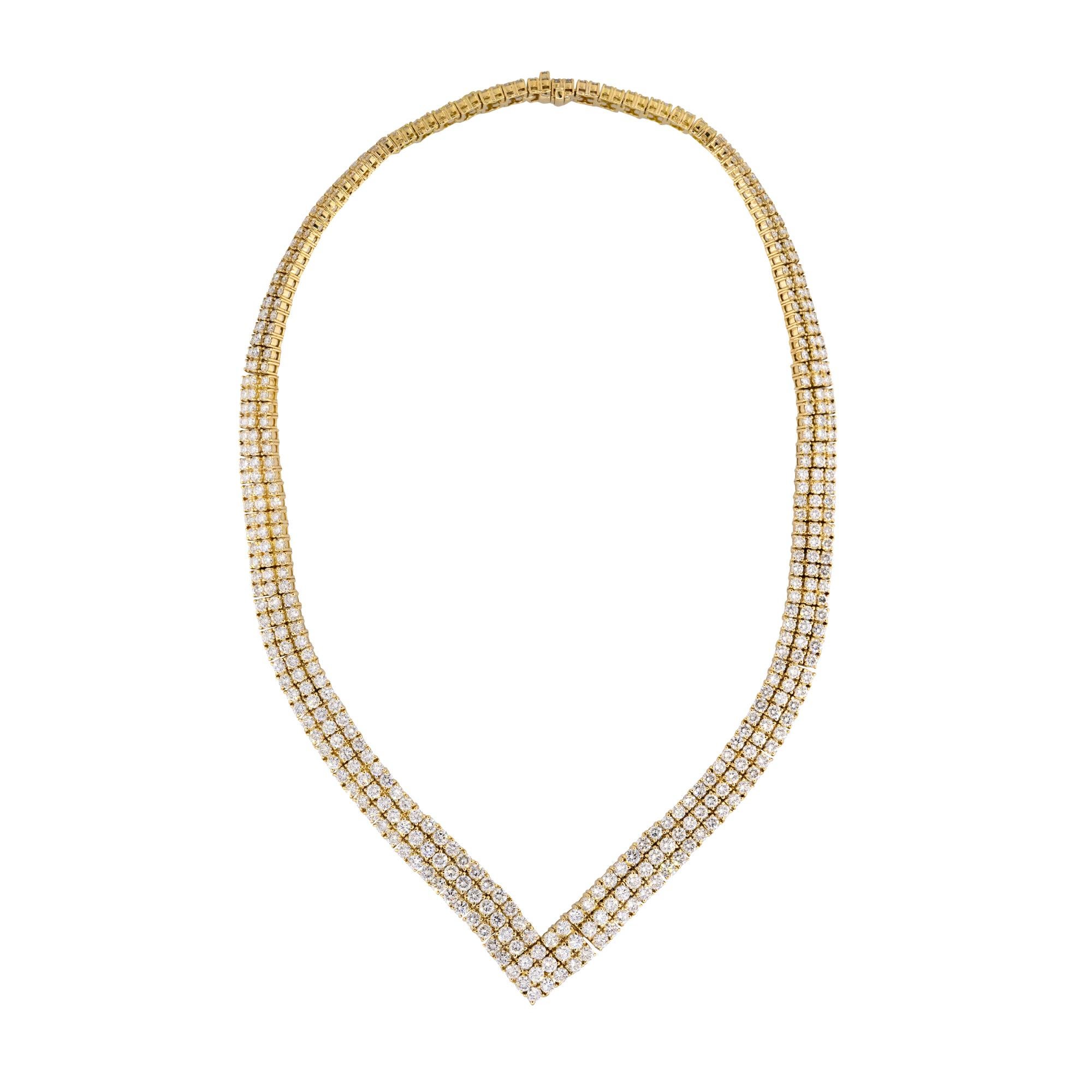With almost 30 carats of near colorless diamonds, this beautiful diamond necklace sparkles from a mile away. This necklace consists of 3 rows of approximately 495 diamonds and is set in 18 karat yellow gold. This timeless piece of jewelry would make