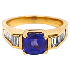 2.95 Carat Tanzanite and  White Diamond Yellow Gold Ring