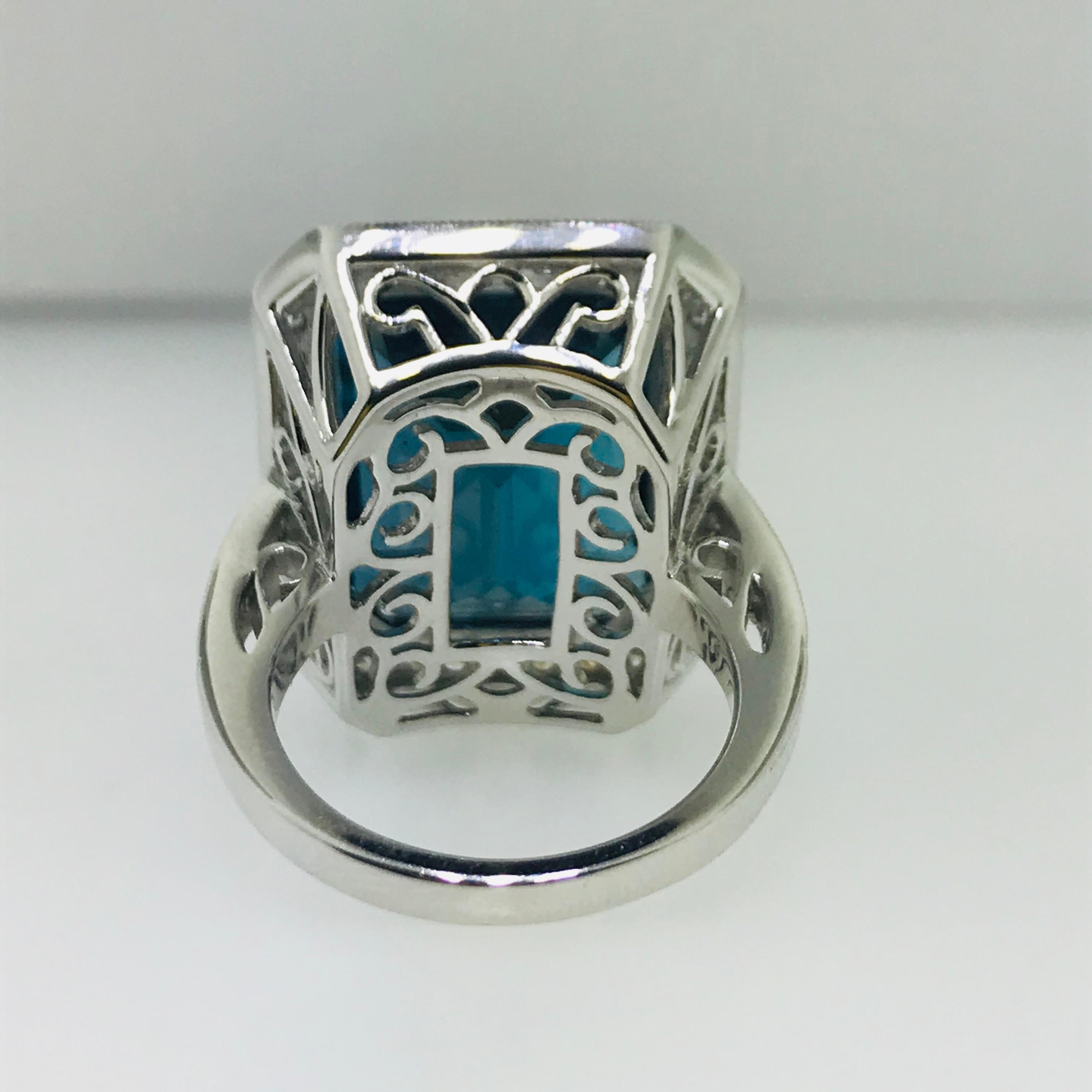 29.5 Emerald Cut London Royal Blue Topaz and 1 Carat Diamond Halo Cocktail Ring In New Condition In Austin, TX