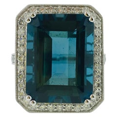 29.5 Emerald Cut London Royal Blue Topaz and 1 Carat Diamond Halo Cocktail Ring