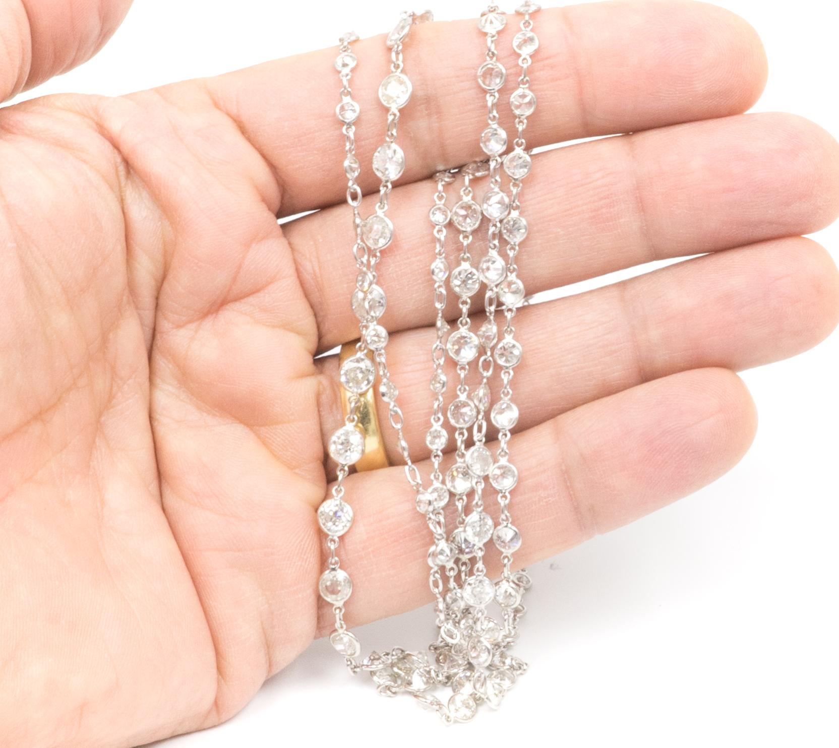Diamonds by the yard style Handmade Necklace with 126 old mine cut Diamonds - in Platinum
43 inches long - 
Diamonds graduate from 3.0mm - 4.5 mm.   
Total diamond weight is approximately 29.50 carats total.  G-H Color, VS1-Si2
19.60 grams total. 