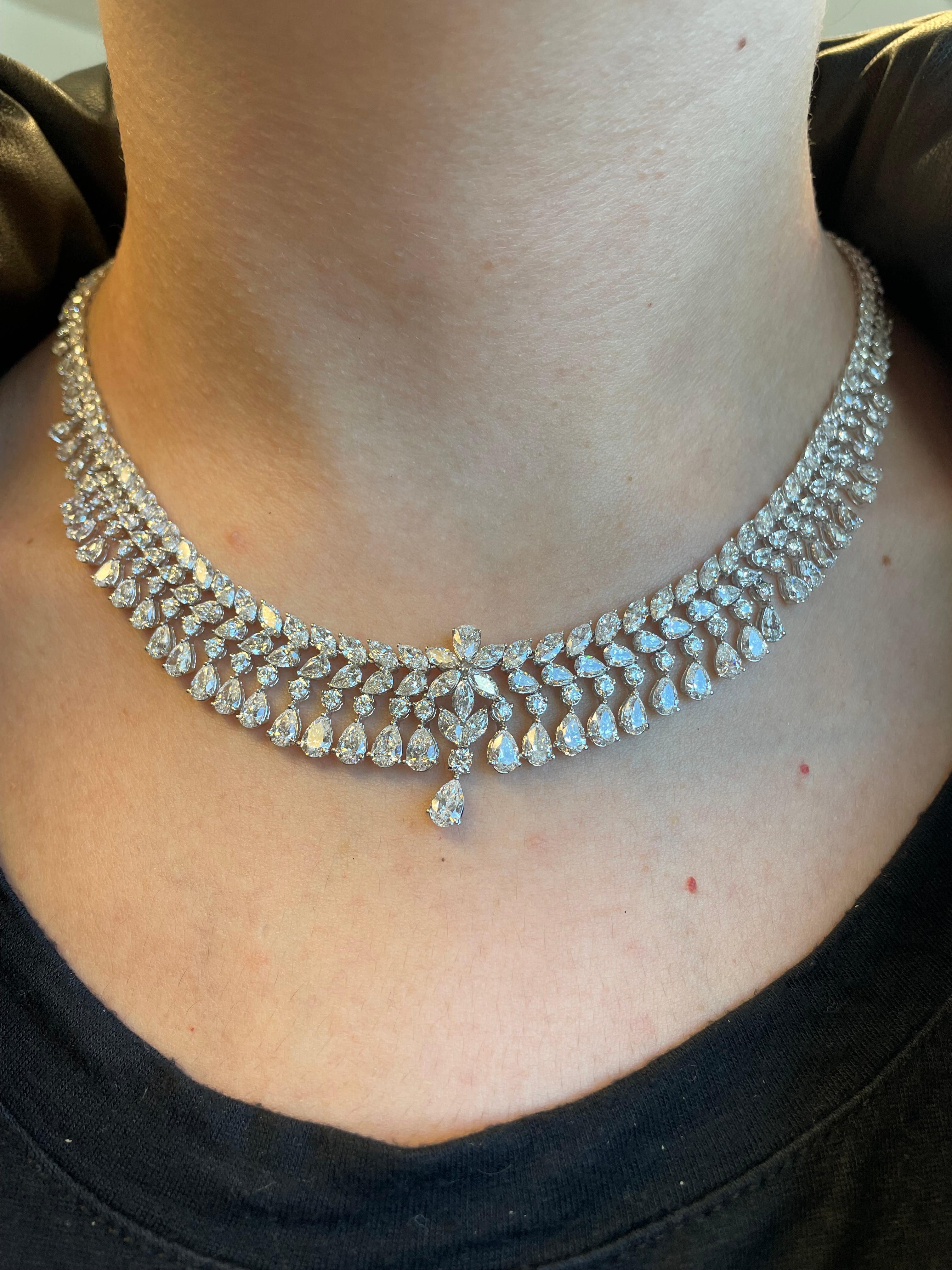 Exquisite diamond layout necklace. Created by Alexander of Beverly Hills.
29.58 carats of round brilliant, pear, and marquise cut diamonds. Approximately G/H color and VS2/SI1 clarity. 18k white gold. 
Accommodated with an up-to-date appraisal by a