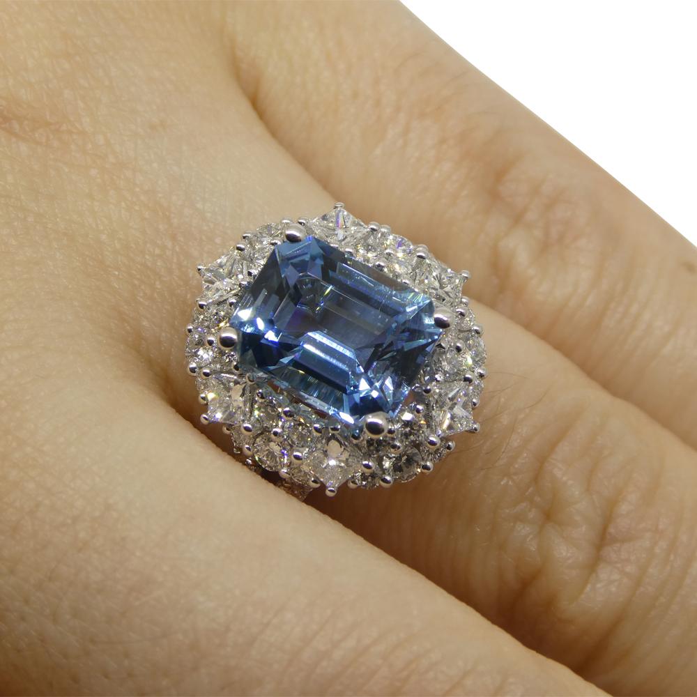
Introducing our exquisite Emerald-Cut Aquamarine and Diamond Ring, a captivating blend of sophistication and elegance. At its center lies a magnificent emerald-cut aquamarine, weighing 2.95 carats. This aquamarine, revered for its transparency and