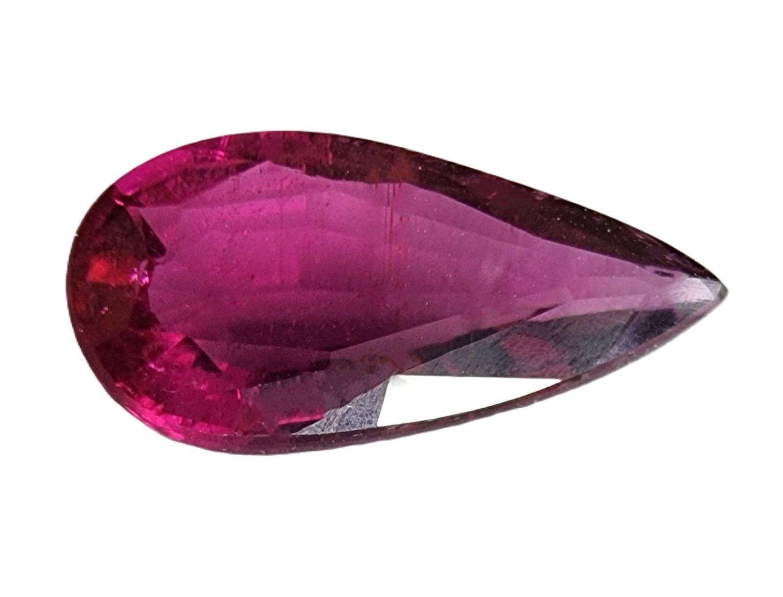 Elevate your jewelry creations  or gemstone collection with the enchanting beauty of this 2.95ct Pear Cut Pinkish Red Rubellite Tourmaline. This gemstone showcases a pinkish-red hue that exudes warmth and charm. The pear cut, with its timeless
