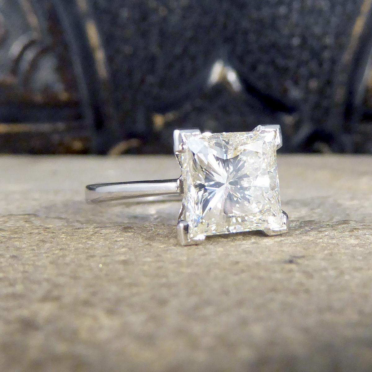 Such an exquisite Diamond single stone ring. The modified square princess cut diamond weighs 2.95ct and is the feature of this ring with great clarity of VS1 and colour accessed at K. It would make the perfect engagement ring with the single stones