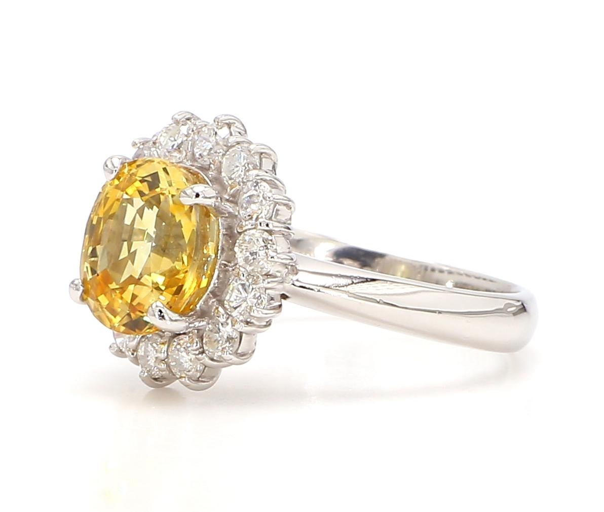 Modern 2.96 Carat Yellow Sapphire and Diamond 18K Gold Ring For Sale
