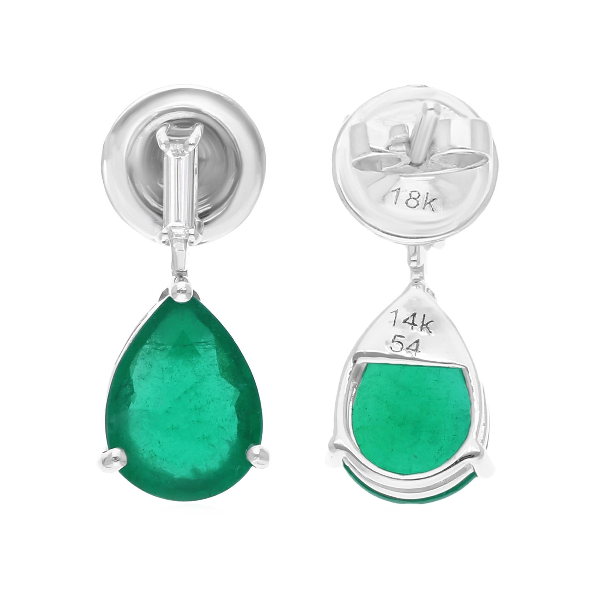 Diese exquisiten Ohrringe aus 14-karätigem Gold sind mit einem sambischen Smaragd von 2,96 Karat und 0,12 Karat funkelnden Diamanten besetzt.

FOLLOW SPECTRUM JEWELS Storefront, um die neueste Collection'S und exklusive Stücke zu sehen. Spectrum