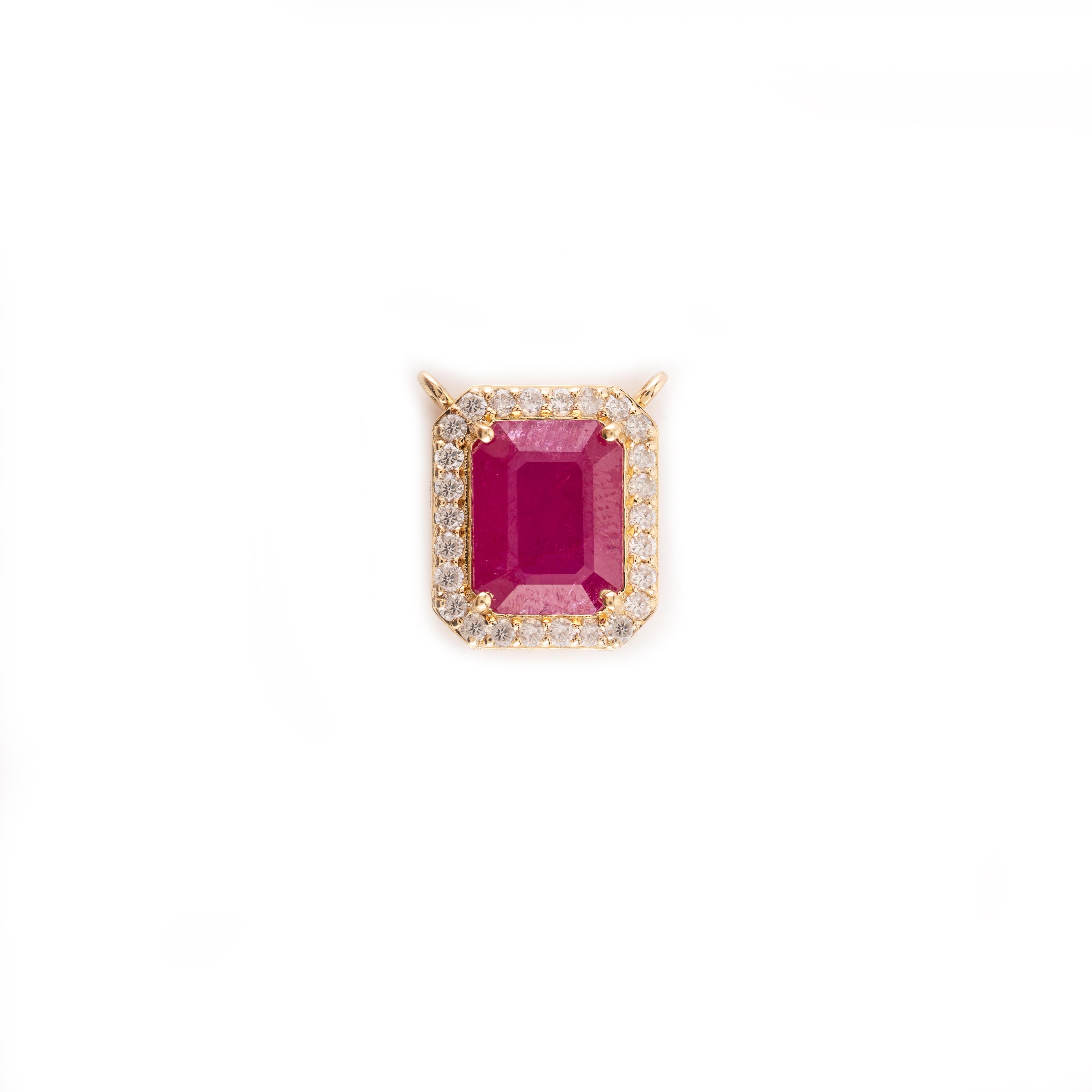 Octagon Ruby Diamond Halo Pendant in 18K Gold studded with ruby with halo of diamonds. This stunning piece of jewelry instantly elevates a casual look or dressy outfit. 
Ruby improves mental strength. 
Designed with octagon cut ruby with diamonds