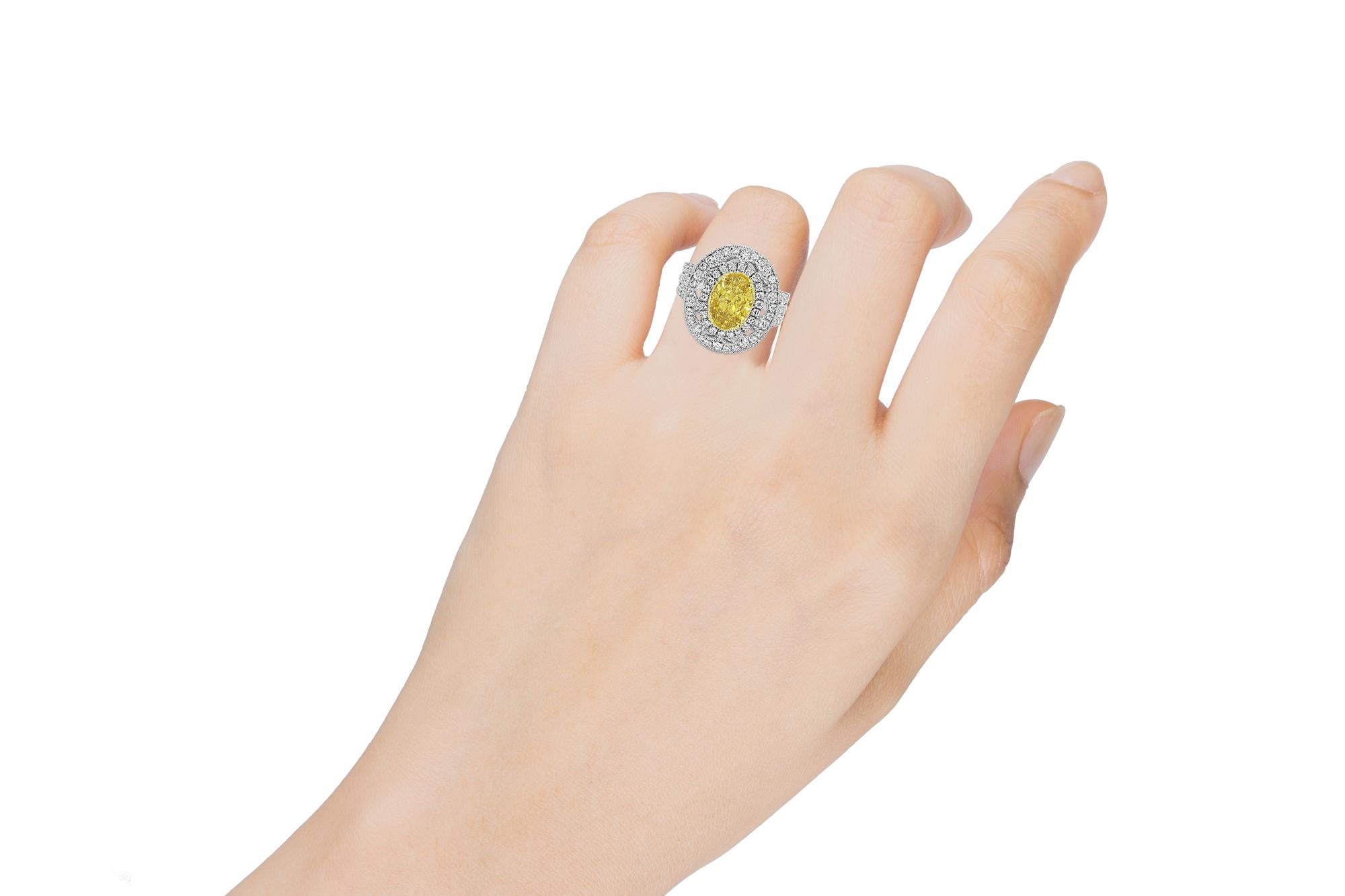 Oval Cut GIA Certified 2.96 Fancy Yellow Diamond White Gold Ring For Sale