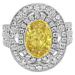 Anello in oro bianco con diamante giallo Fancy 2,96 certificato GIA
