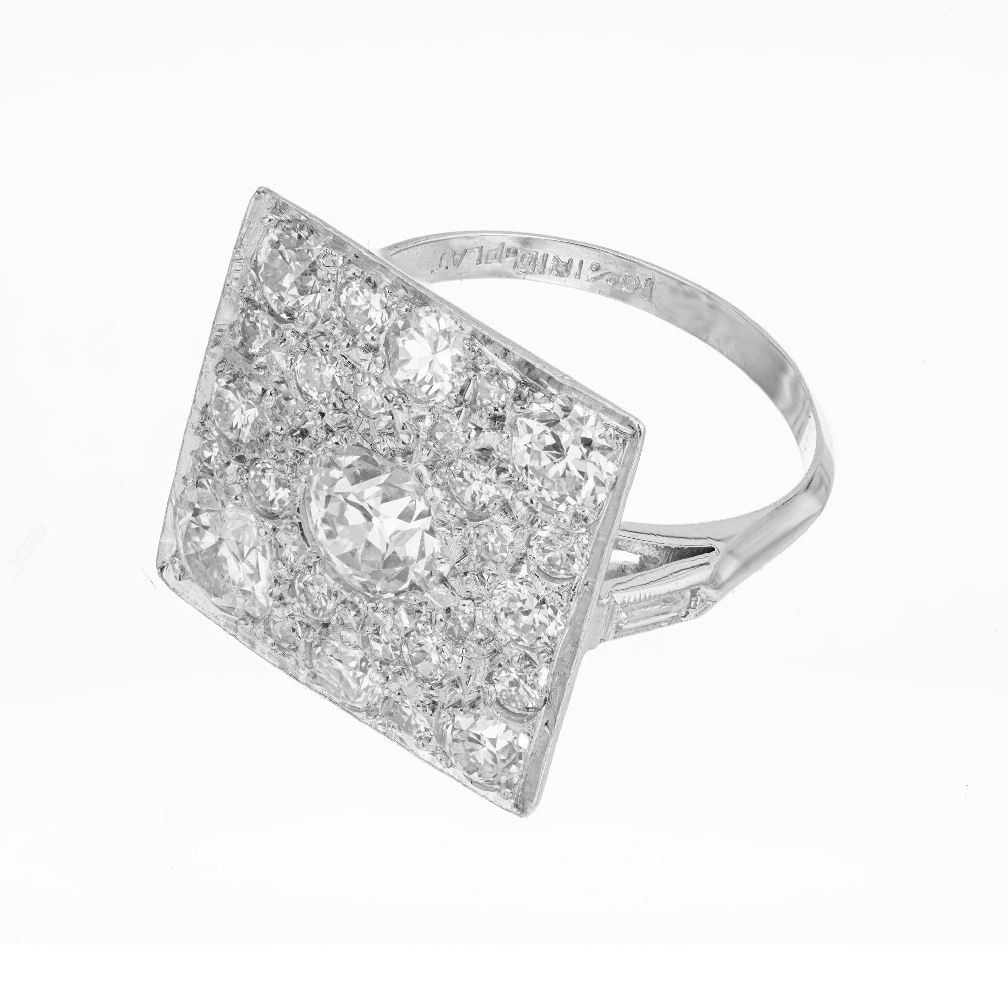 1930's square top diamond cluster cocktail ring. .75ct Old European center diamond mounted in a square top platinum setting accented with 28 different cut diamonds that include round brilliant cut, single cut, old mine cut and old European cut