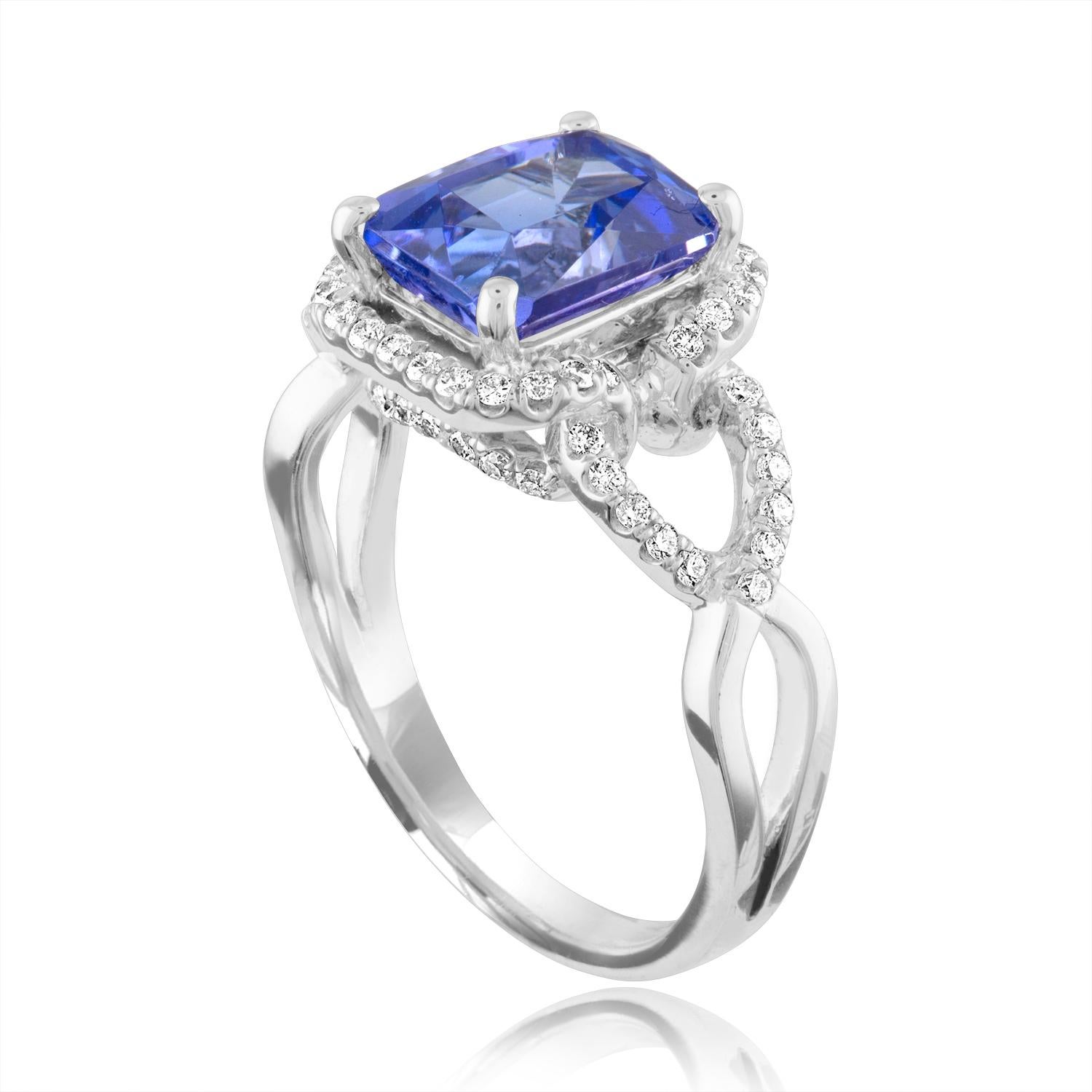 Beautiful Tanzanite Ring
The ring is 18K White Gold
The Center Stone is a Radiant Cut Tanzanite 2.97 Carats
There are 0.35 Carats in Diamonds F/G VS/SI
The ring is a size 6.75, sizable
The ring weighs 5.5 grams