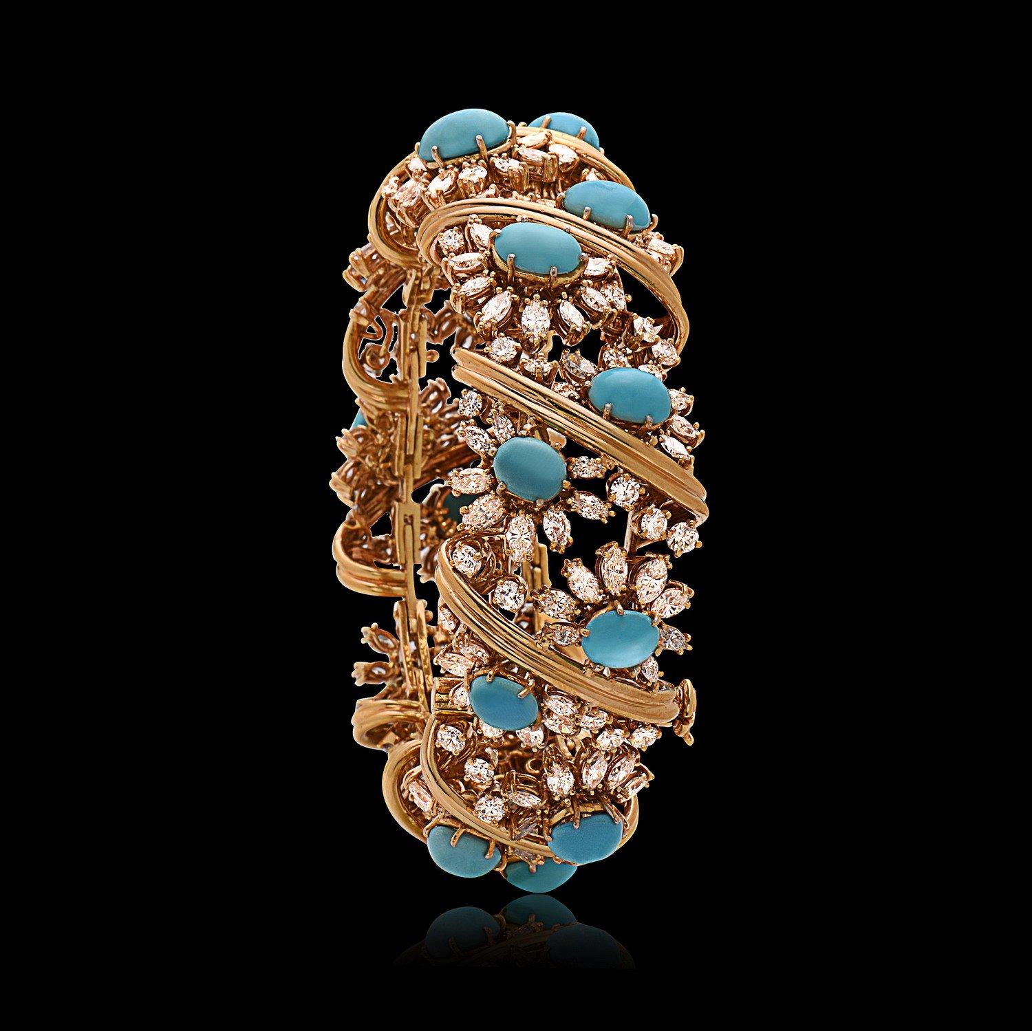 A brilliant, golden bracelet of both beauty and style. 18 Persian Turquoise Cabochons -- surrounded by vibrant white diamonds -- imitate sunflowers as they surround ones wrist. 10 thick wires of gold also hold the piece together, creating a sense of