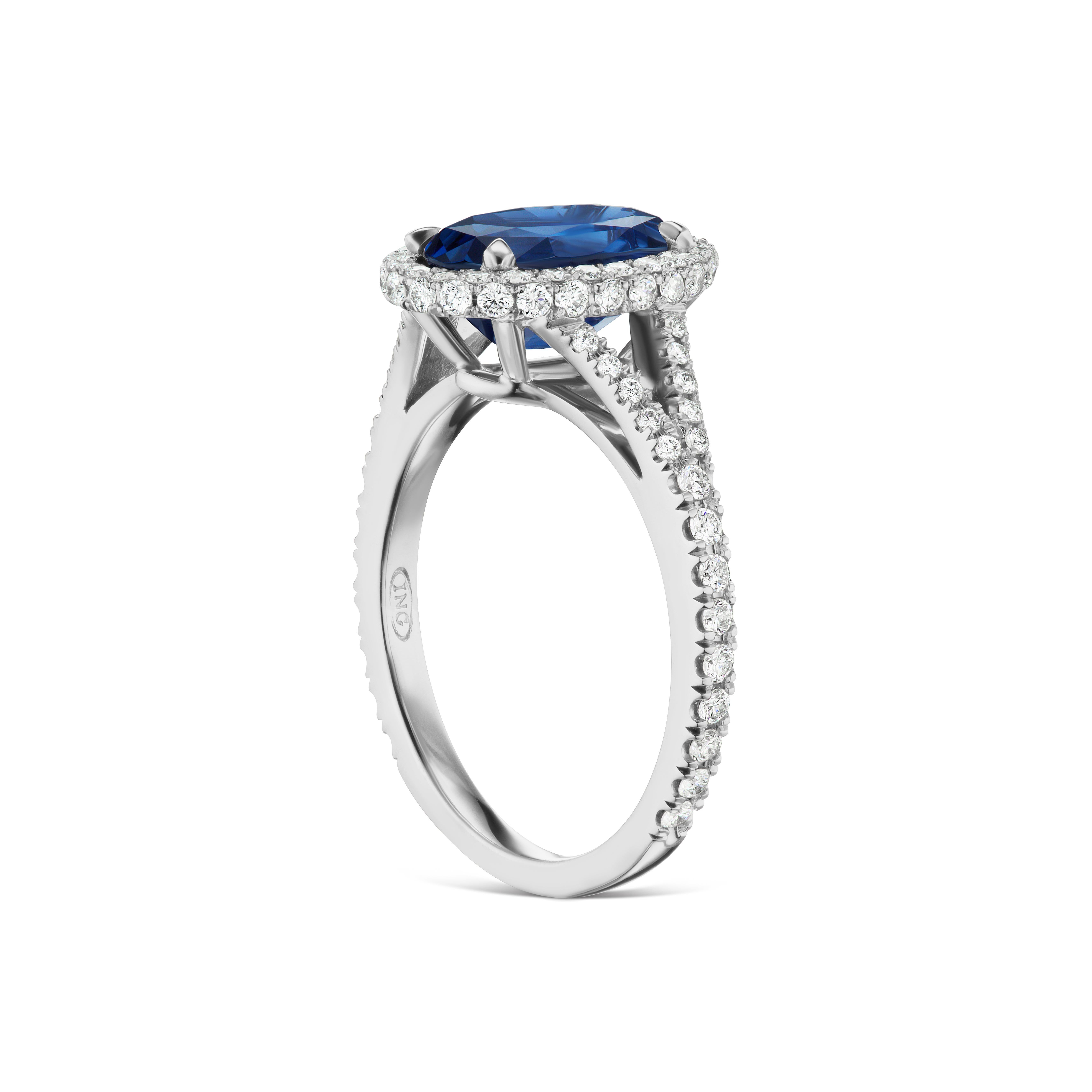 No Heat 2.97ct. GIA Certified Blue Sapphire set in a micro pave diamond halo with .63ct. total weight of FVS diamonds in 14kt.   If you don't see something, Say something! We would be happy to work with you to create your dream ring!