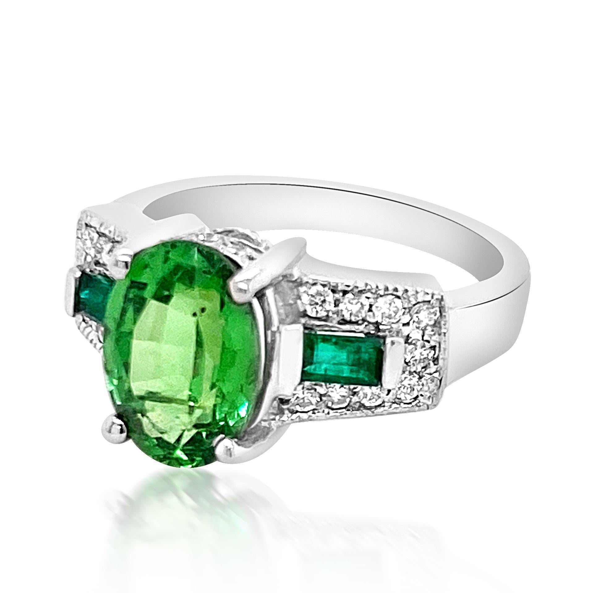  14k W/G RING: 4.33GRAM / TSAVORITE :2.97CT / DIAMOND RD :0.25CT /#GVR1497
This exquisite display of rare glittering 2.97ct oval-shaped green Tsavorite, crafted in warm 14k white gold, is a natural grounder of profuse manifestation. This ring is