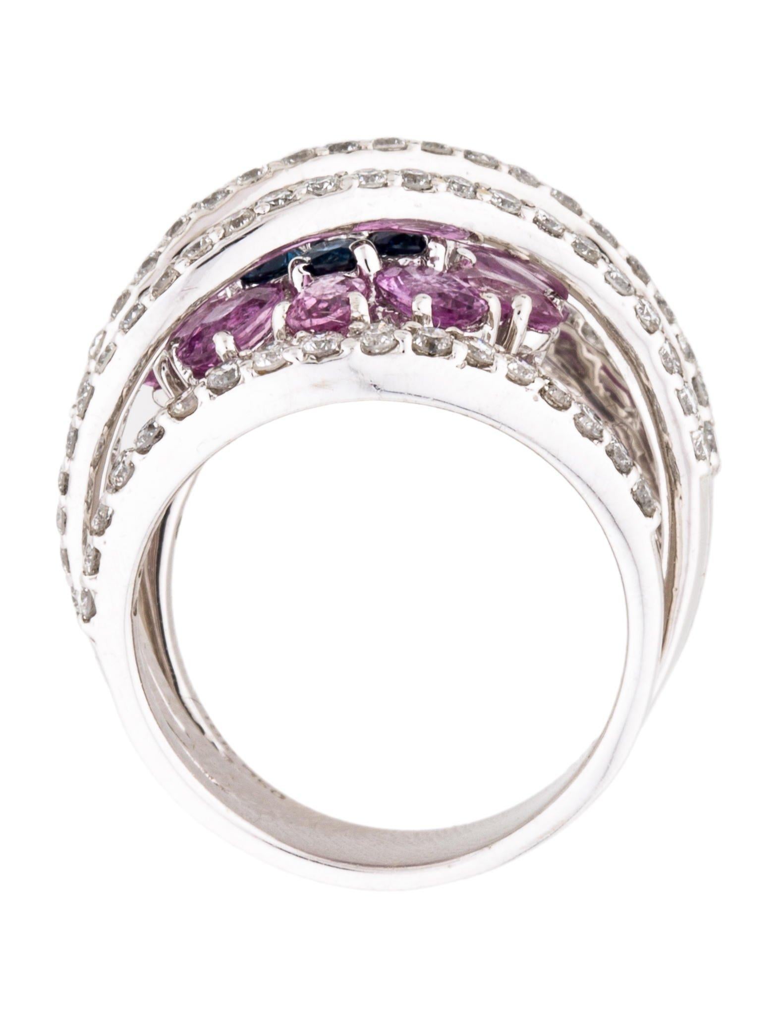 18K white gold band featuring 1.66 carats of round brilliant diamonds and 2.98 carats of pink and blue sapphire.

Ring Size: 7
Metal Type: 18K White Gold
Hallmark: 18K, 750
Location: Inside Shank
Metal Finish: High Polish
Total Item Weight (g):