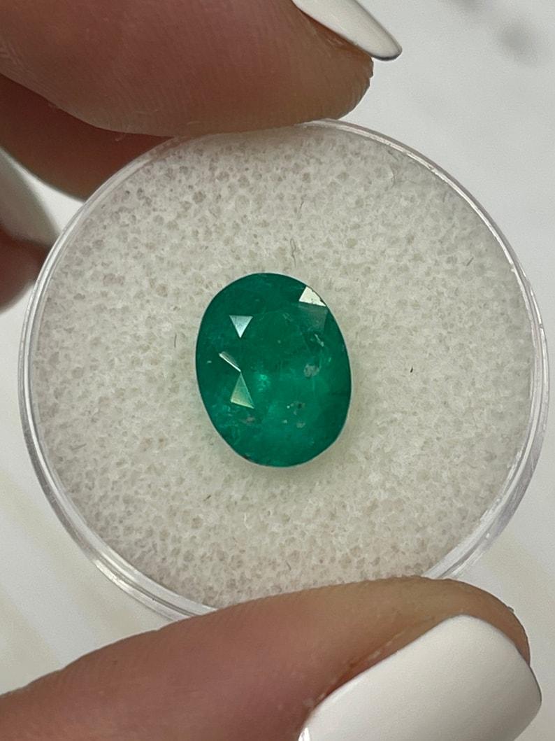 Women's or Men's 2.98 Carat Intense Dark Green Colombian Emerald Oval Cut - May Birthstone Gem For Sale