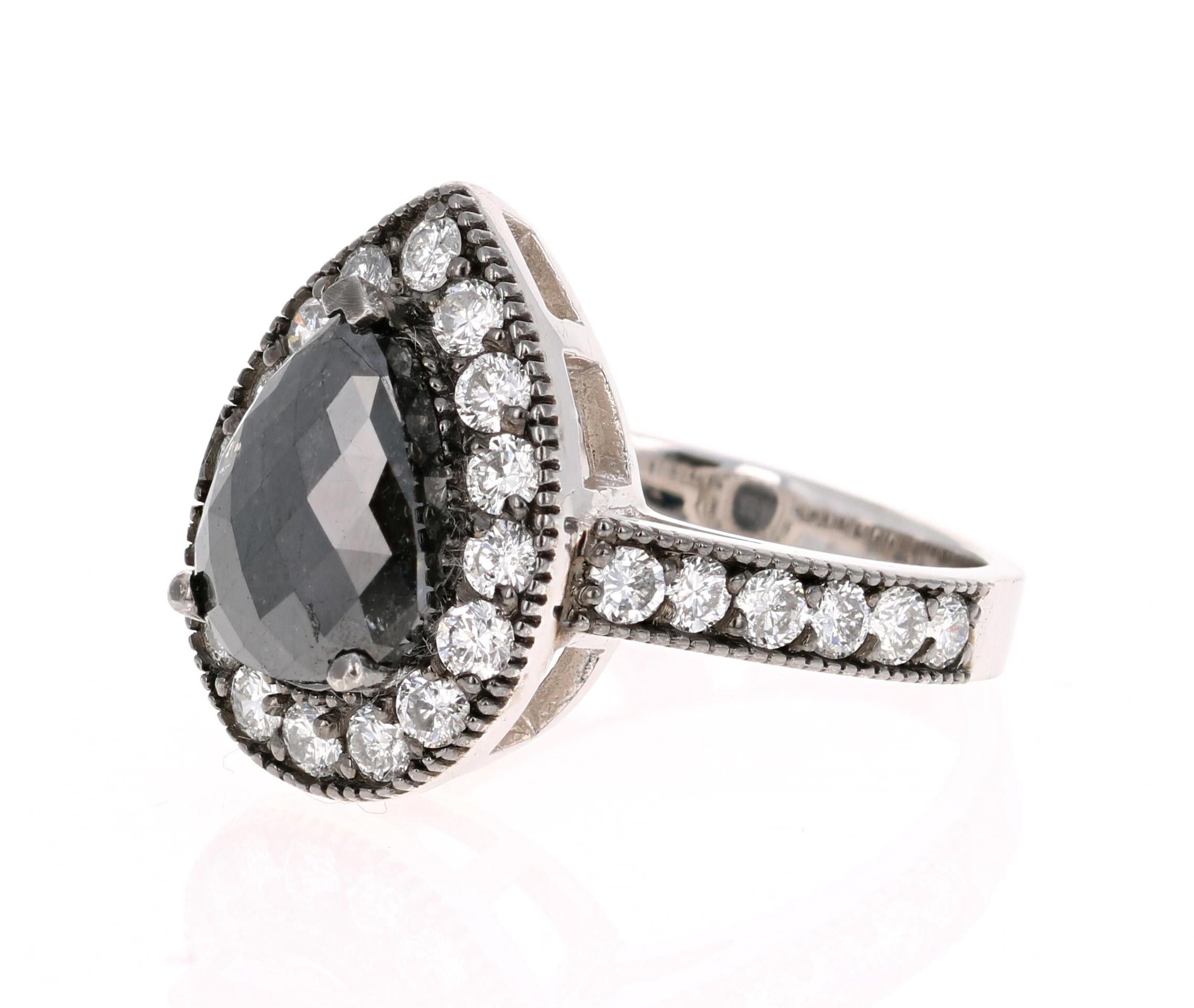 black pear shaped engagement ring