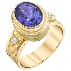 2.98 Carat Tanzanite and Diamonds 18 Karat Yellow Gold Ring