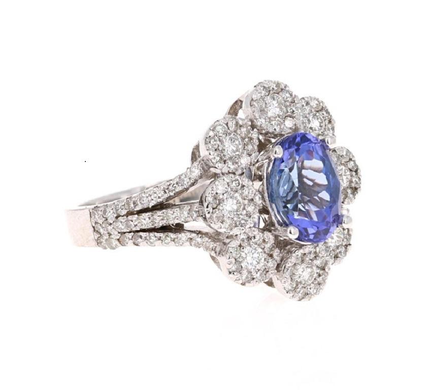2.98 Carat Tanzanite Diamond White Gold Cocktail Ring

Elegant & Classic Tanzanite & Diamond Ring! 

This ring has a radiant bluish-purple Oval Cut Tanzanite weighing 1.98 Carats. It is surrounded by 126 Round Cut Diamonds that weigh 1.00 Carats.