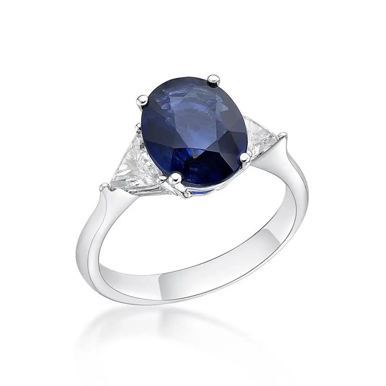 Triangular Blue Diamonds 2.98 Carat Vivid Deep Blue Oval Sapphire and Diamonds Engagement Ring ...