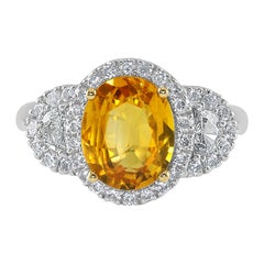 2.98 Carat Yellow Sapphire and Diamond Three-Stone Ring Set in 18 Karat