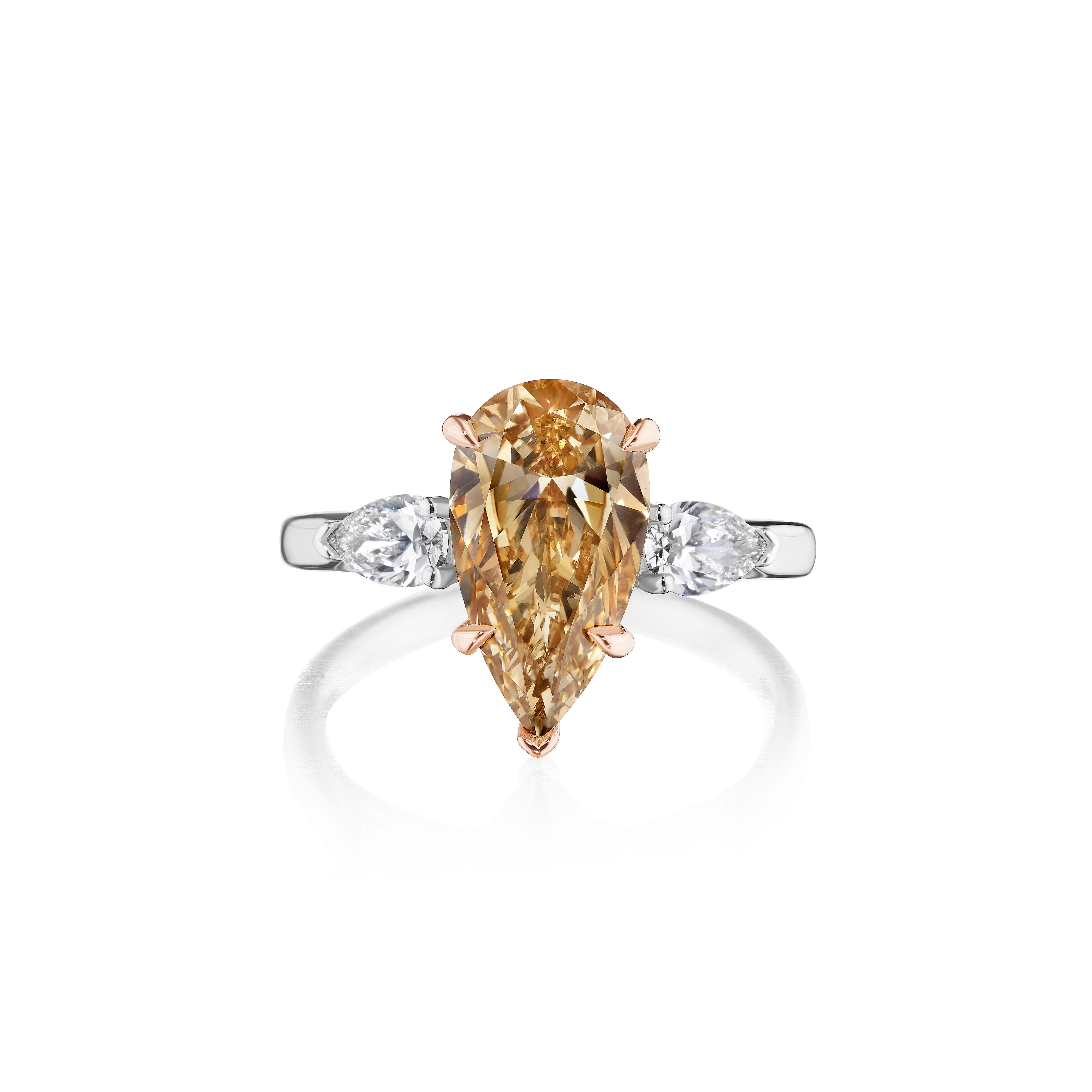 •	Platinum & 18KT Two Tone
•	2.98 Carats
•	Size: 6.5

•	Number of Pear Shape Diamonds: 1
•	Carat Weight: 2.51ctw
•	Color: Fancy Brown Yellow
•	Clarity: SI1
•	Stone Measurements: 13.01 x 7.20mm
•	GIA: 5221930382

•	Number of Pear Shape Diamonds:
