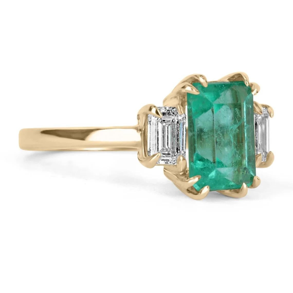 Shower her with love with this Colombian emerald and diamond three-stone ring. An extraordinary custom-created ring. Designed and created by our own master jeweler, 