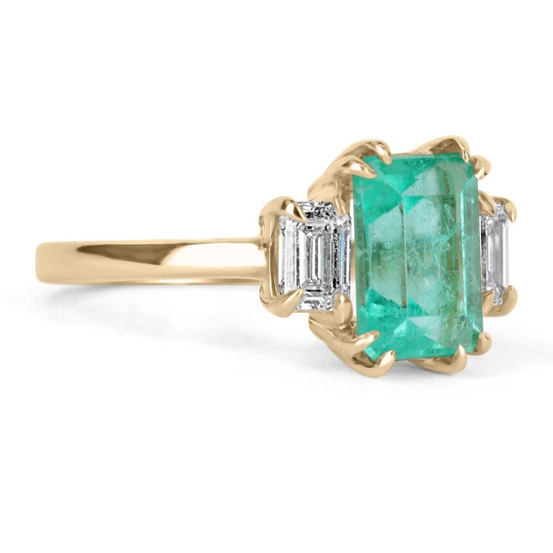 Shower her with love with this Colombian emerald and diamond three-stone ring. An extraordinary custom-created ring. Designed and created by our own master jeweler, 