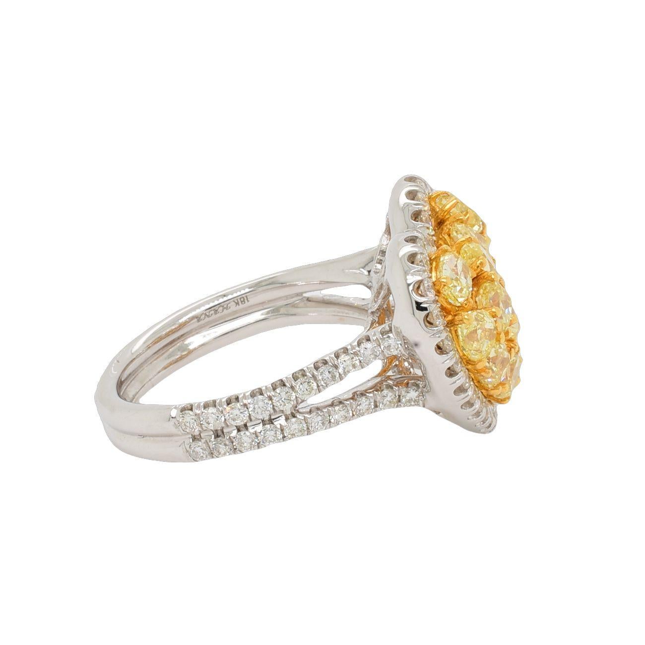 Beautiful 2.99 Carat Natural Fancy Yellow Diamond Heart Cluster Ring made by Shimon's Creations. This ring features 2.14 Carats of Natural Fancy Yellow Diamonds and 0.85 Carats of White Diamonds. This heart design cocktail ring is a great gift to