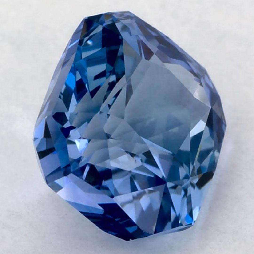 Pierre précieuse taille radiant saphir bleu 2.99 carats en vente 2