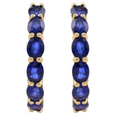 2.99 Ct. T.W. Blue Sapphire Hoop Earrings in 14K Yellow Gold