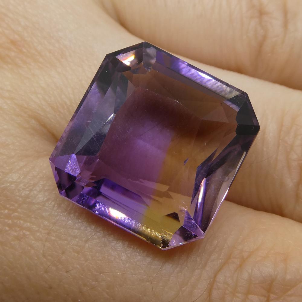 Description:

Gem Type: Ametrine
Number of Stones: 1
Weight: 29.92 cts
Measurements: 19.20x19x11.10 mm
Shape: Square
Cutting Style Crown: Modified Brilliant
Cutting Style Pavilion: Step Cut
Transparency: Transparent
Clarity: Very Slightly Included:
