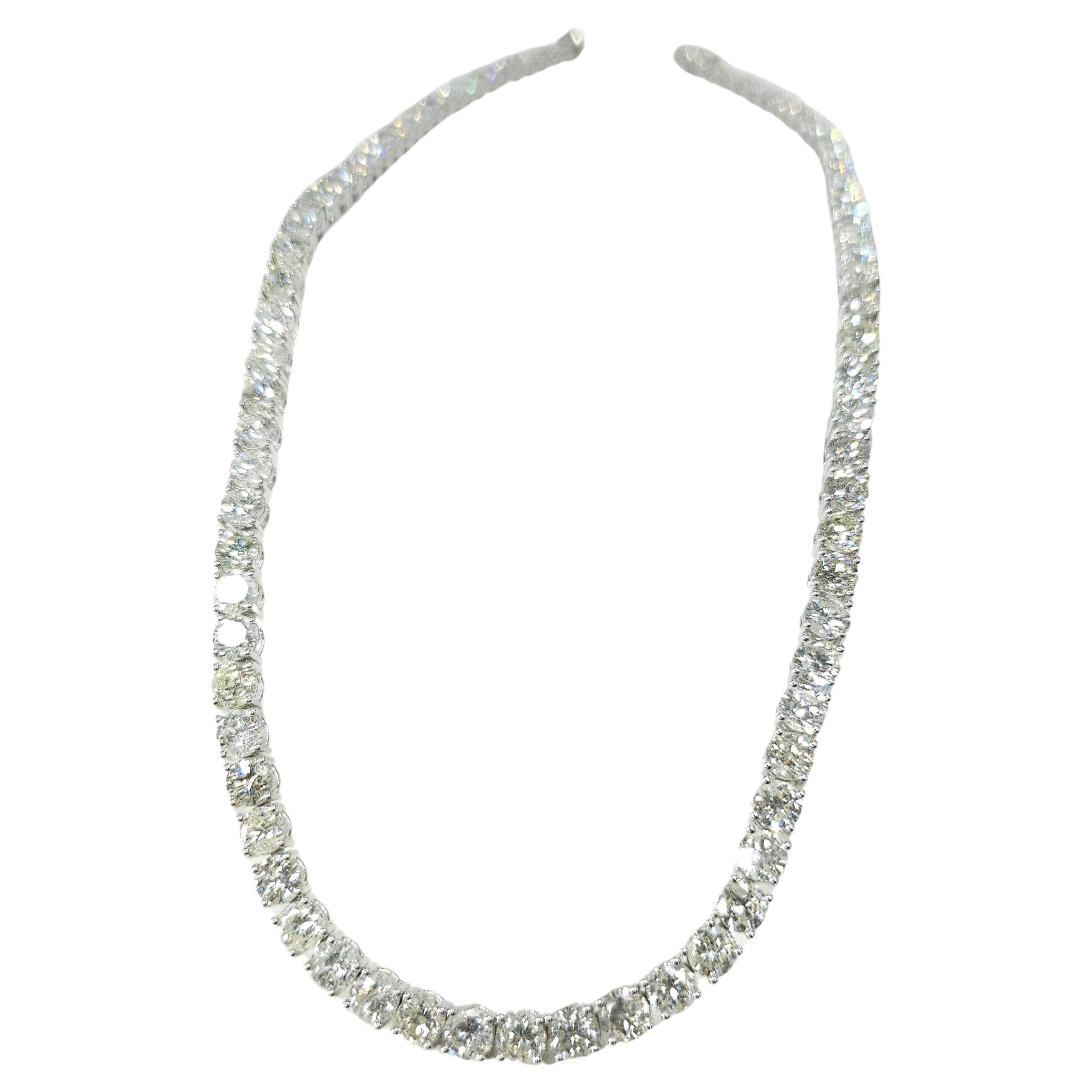 Adorn your wrist with the timeless elegance and shimmering beauty of this exquisite 29.96 Carat Total Round Diamond Tennis Necklace in 18K White Gold. Crafted to perfection, this necklace is a true statement piece that exudes luxury and