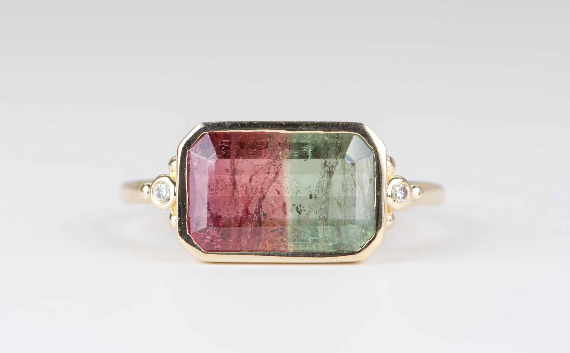 ♥  A solid 14K yellow gold ring set with a large bi-color watermelon tourmaline in the center, flanked by diamonds and gold beads on each side
♥  This is a stunning statement ring, the tourmaline has a vibrant mix of pink and green colors
♥  The